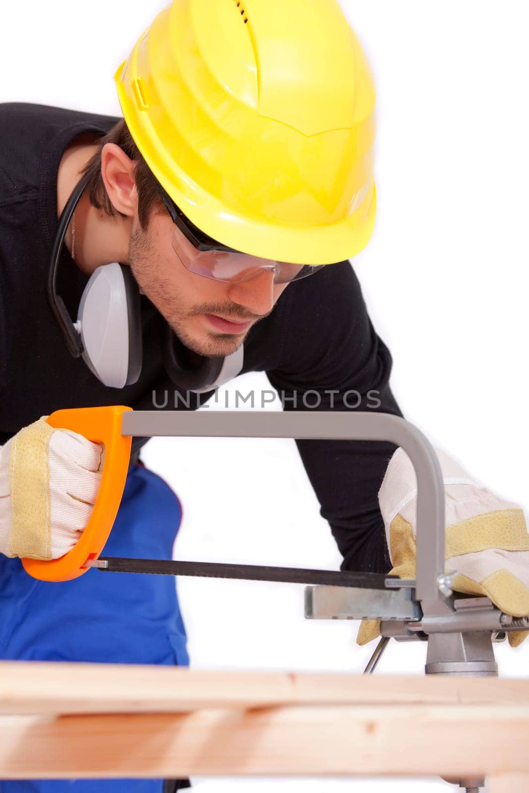 carpenter sawing wood