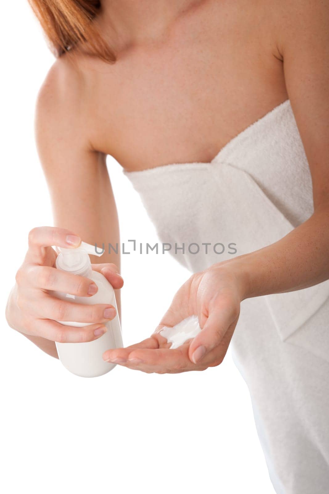 Body care - young woman apply lotion