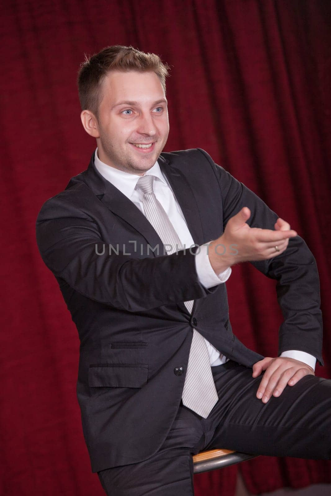 showman talking on stage