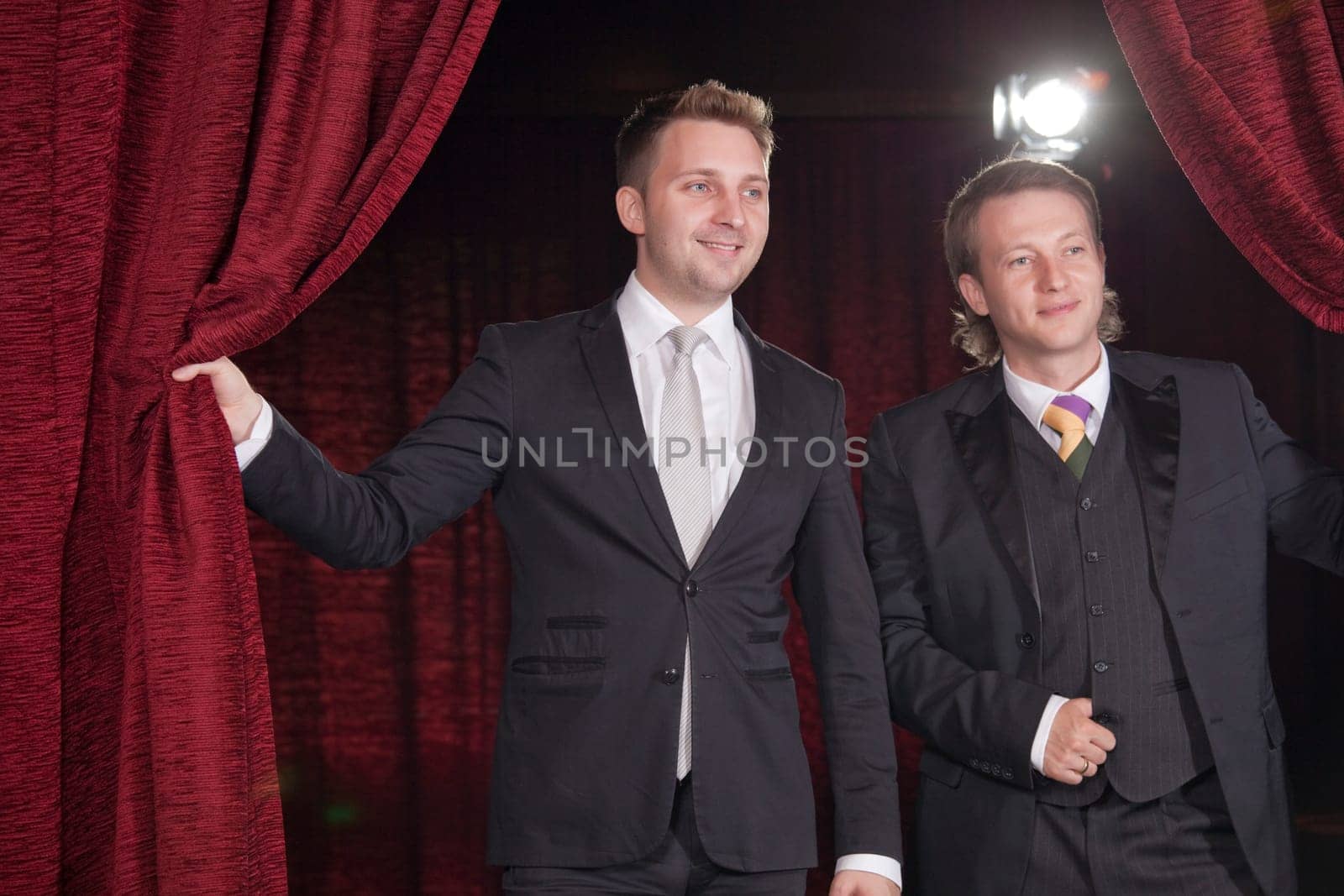 two actors in spotlight