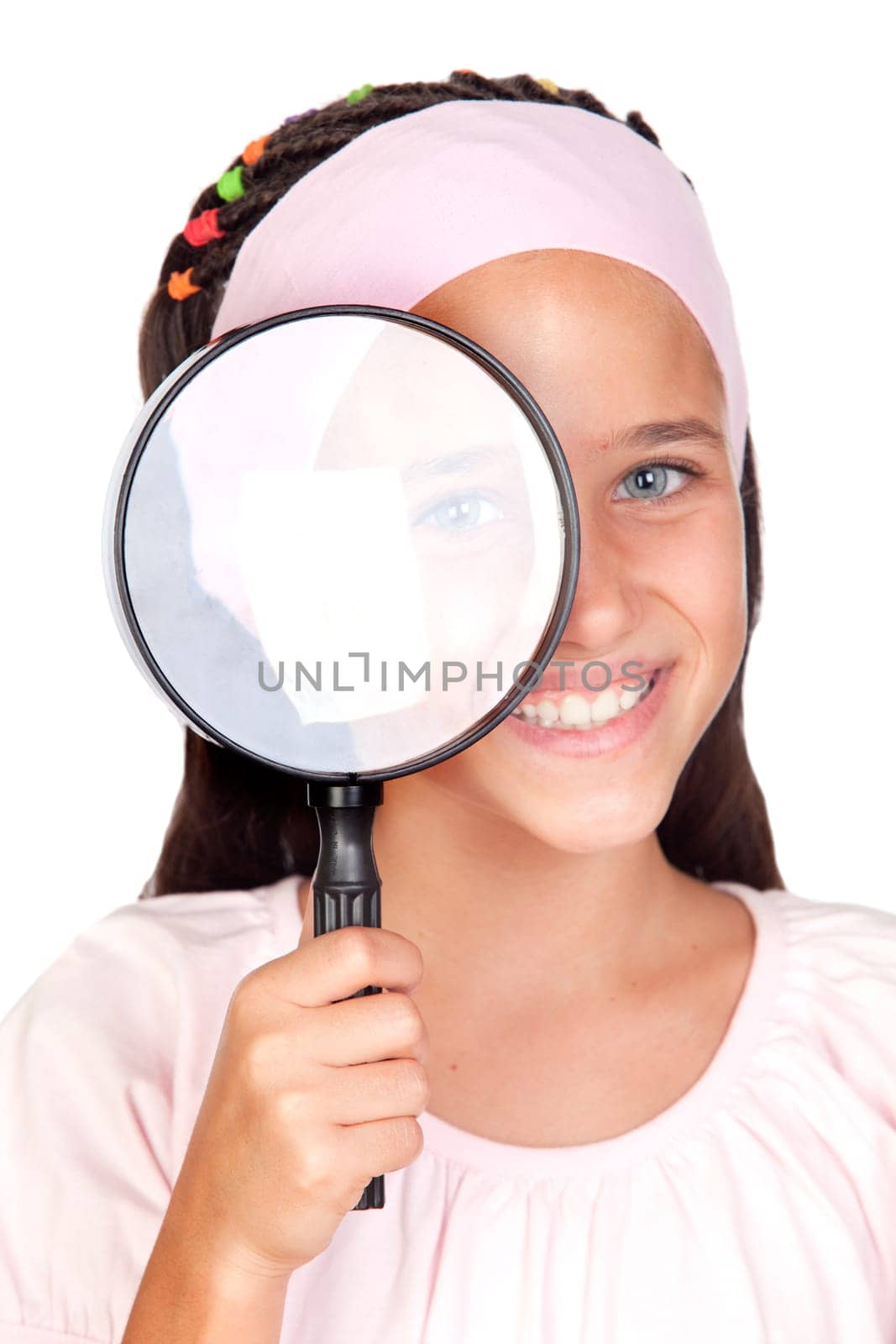 Little girl with a large magnifying glas