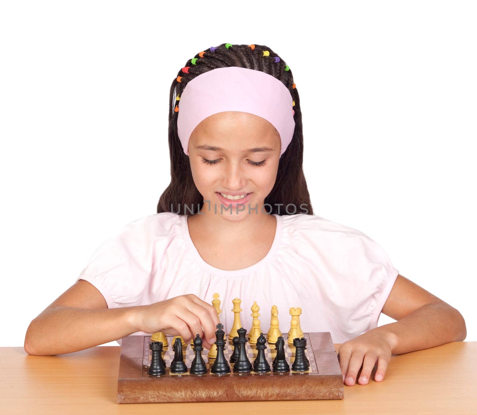 Little girl playing chess