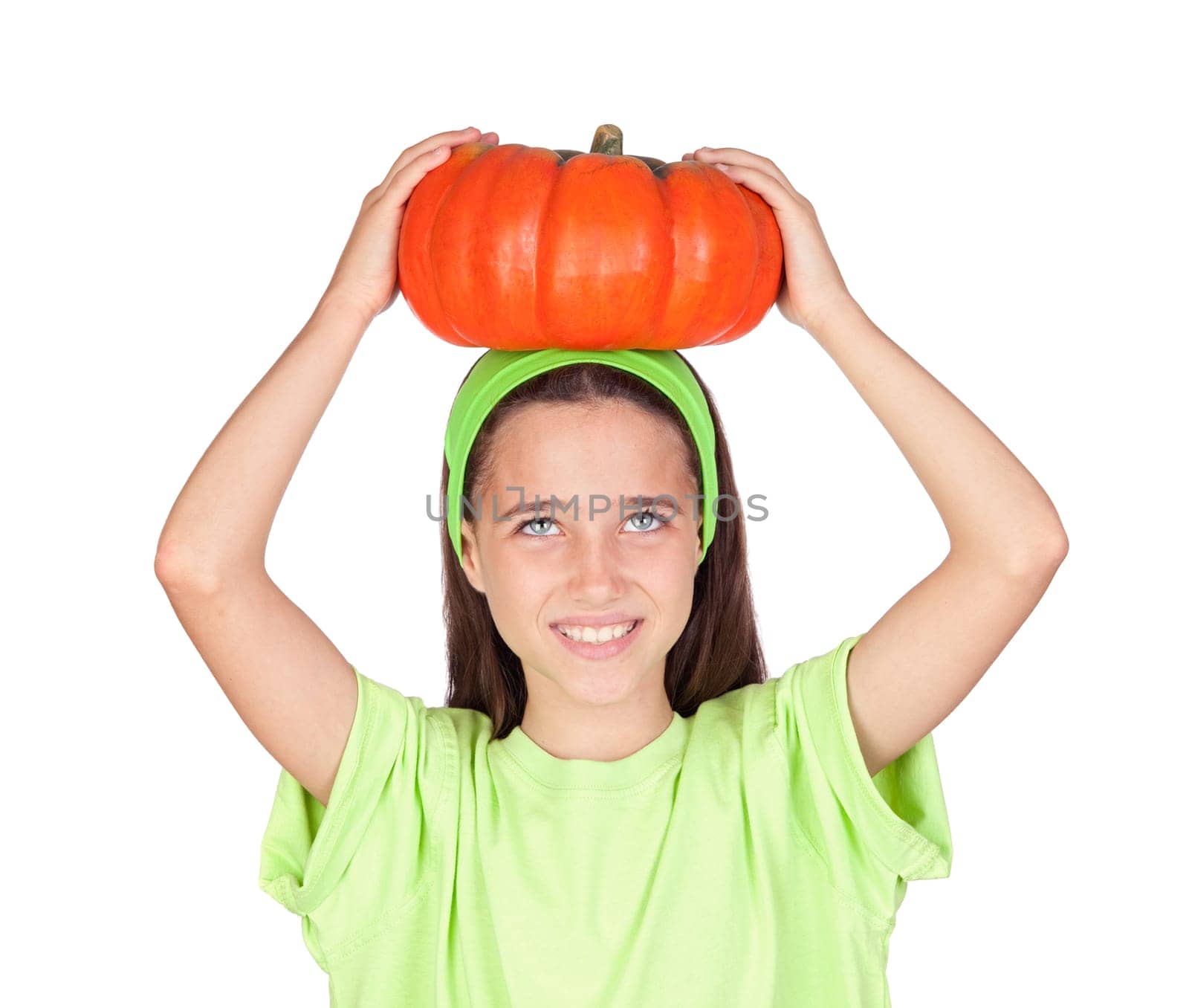 Happy girl in Halloween with a big pumpk