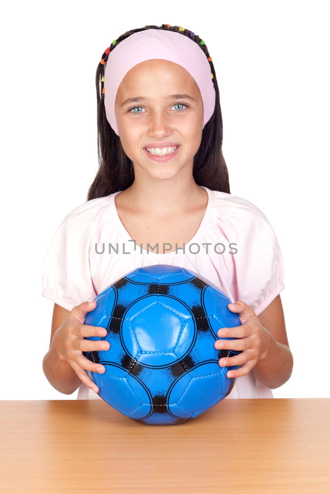 Adorable little girl with soccer ball