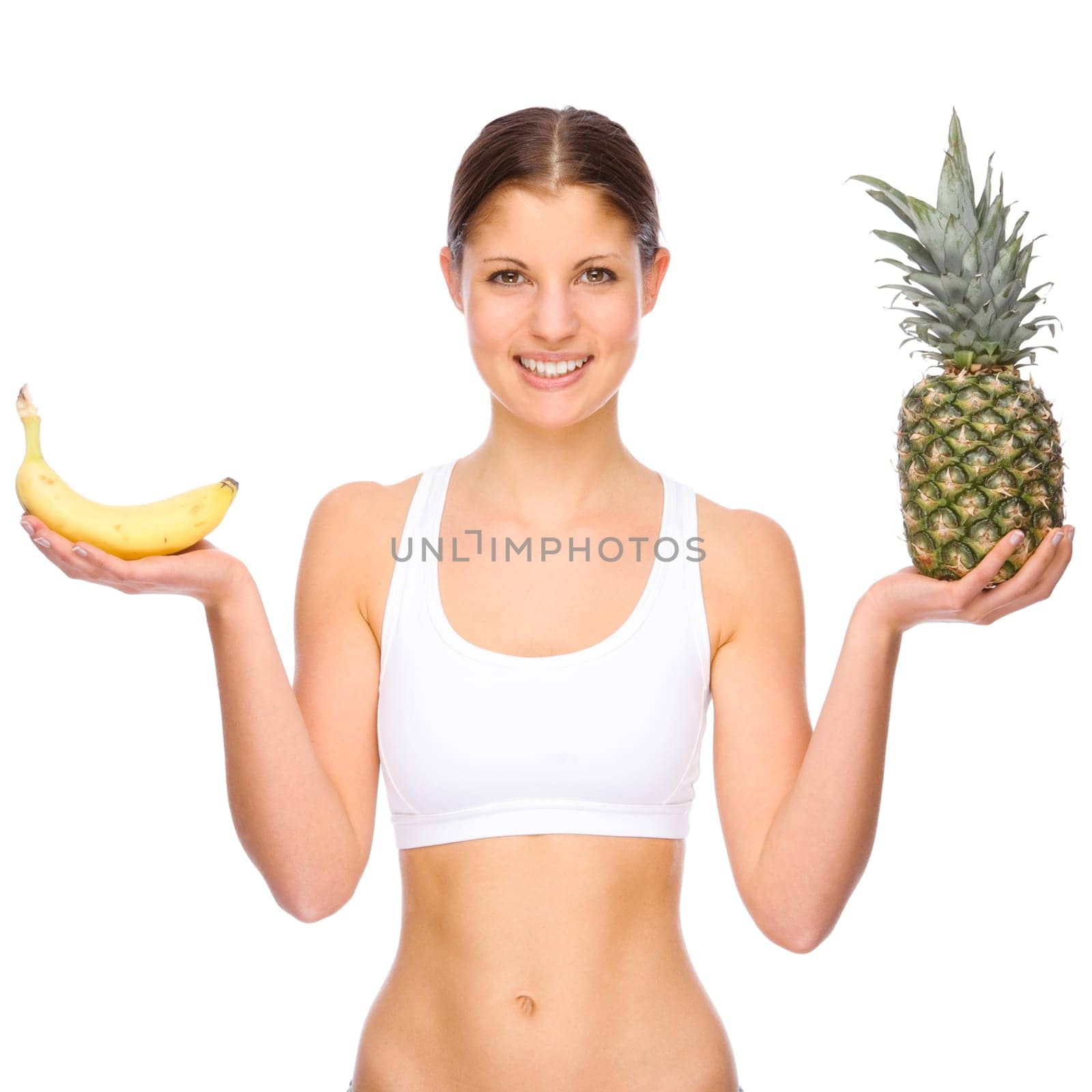 Studio shot of a young woman with fruit