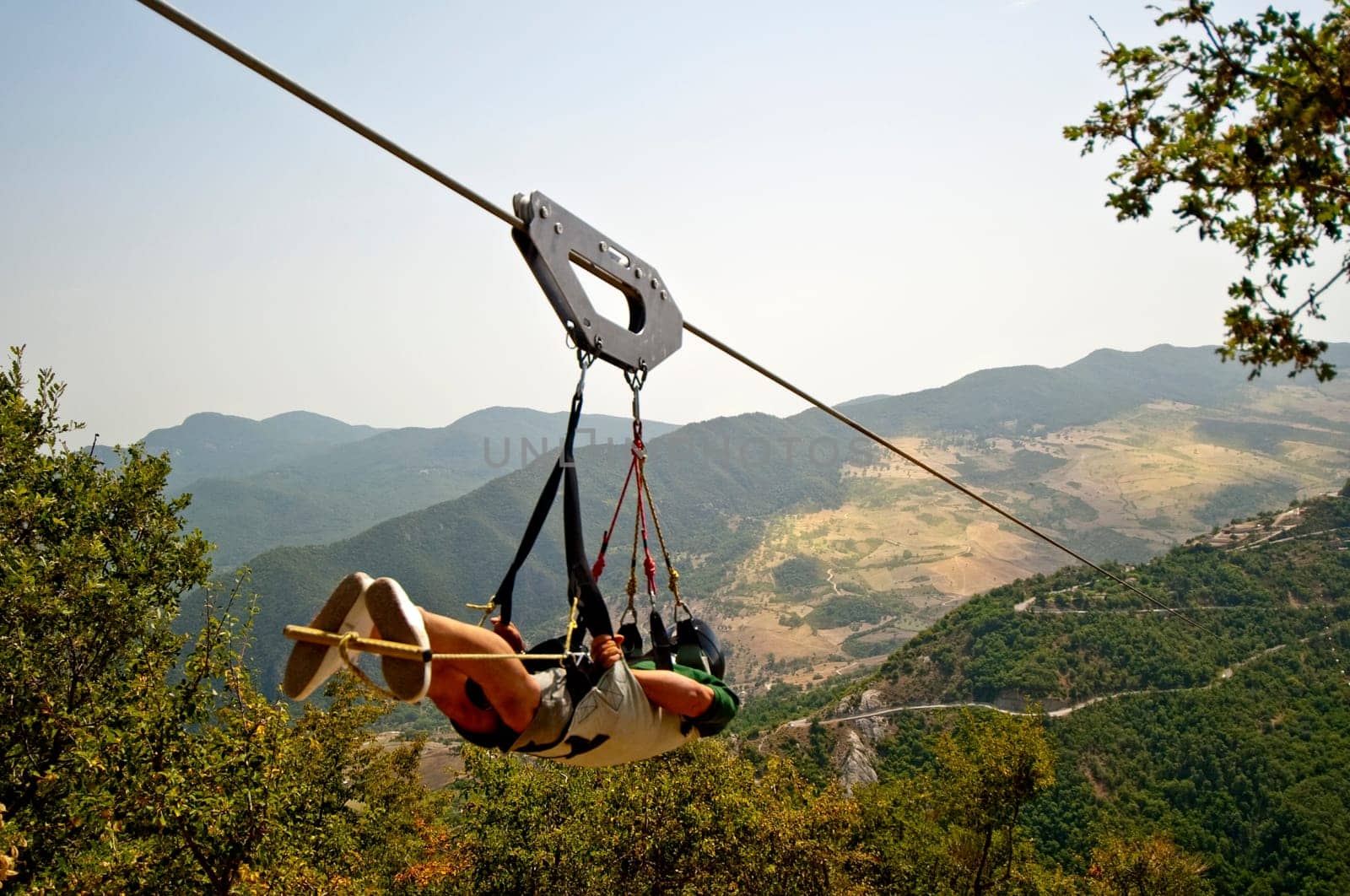Man who makes the flight of the angel in the Lucan Dolomites