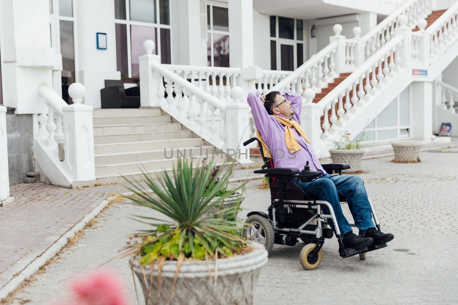 special person with disabilities at the stairs of an office building