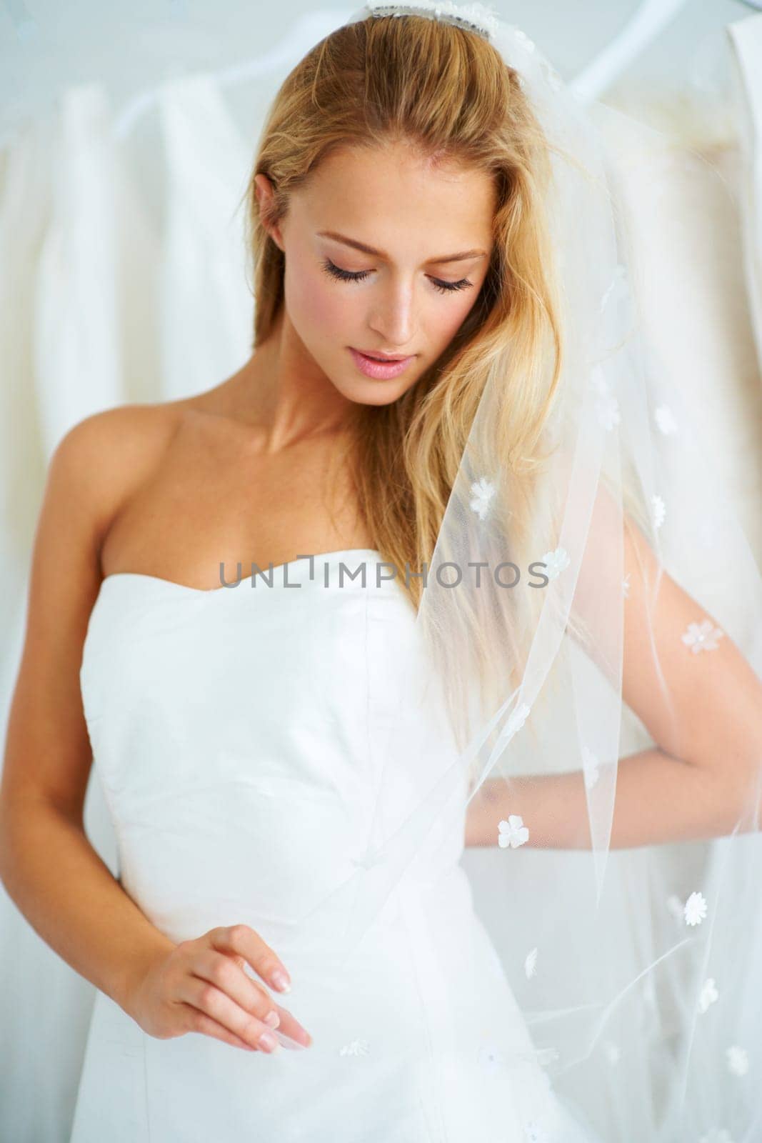 Wedding, beauty and young bride in a dress in a luxury boutique, shop or store in a mall. Retail, romance and female person from Canada preparing for marriage ceremony, party or reception for love.