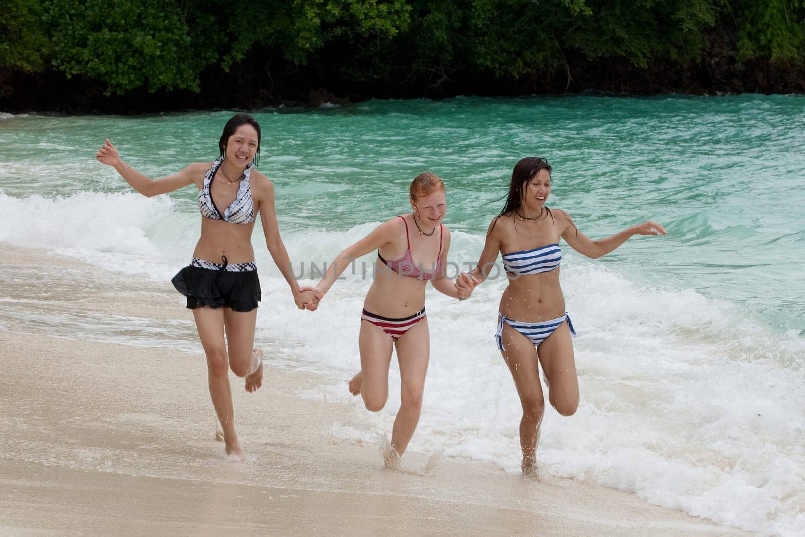 Girl running on the beach