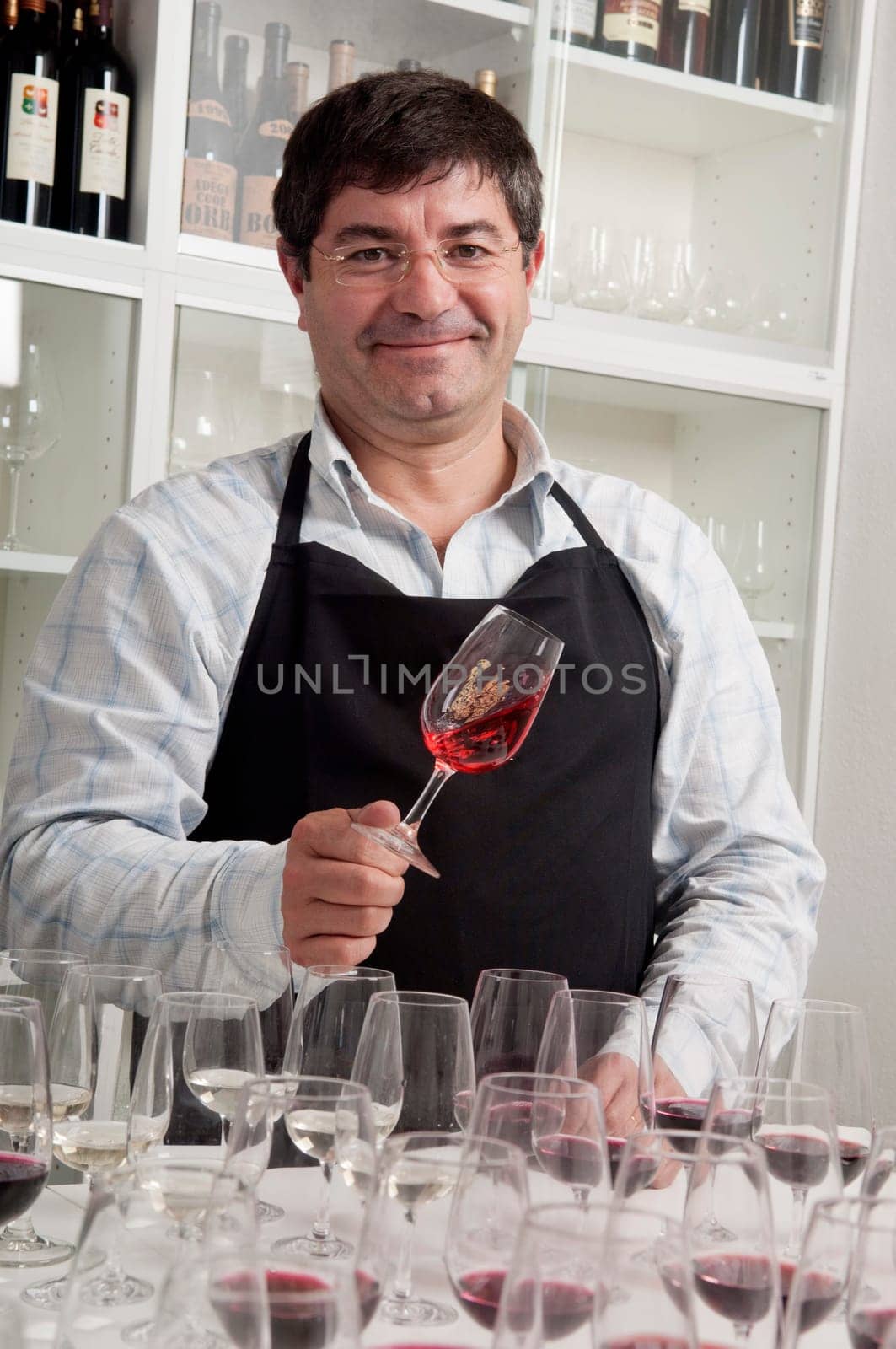 Winemaker tasting wine
