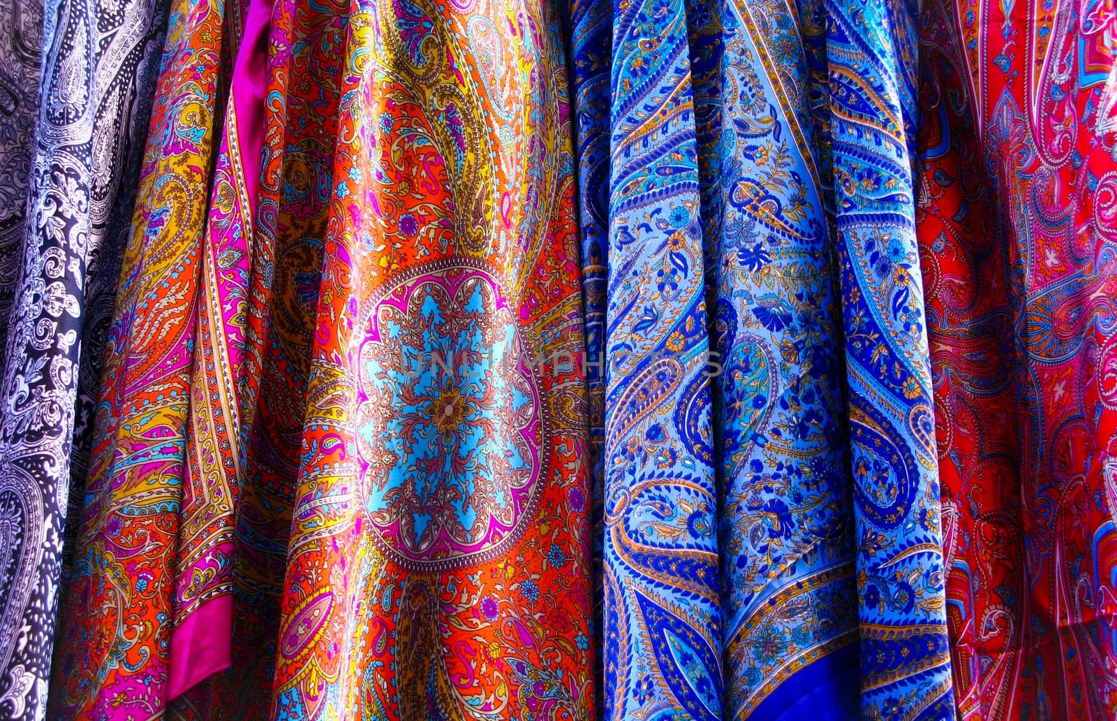 Closeup of several dresses