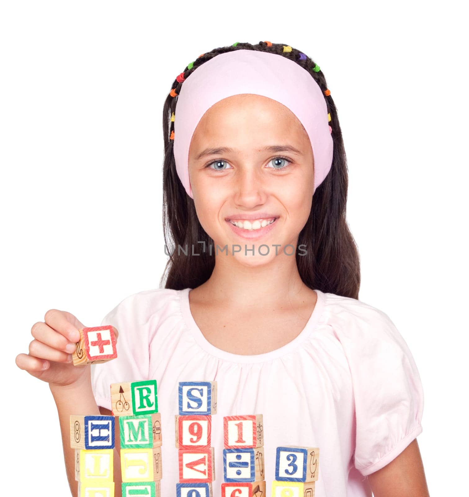 Little girl with wooden blocks stac