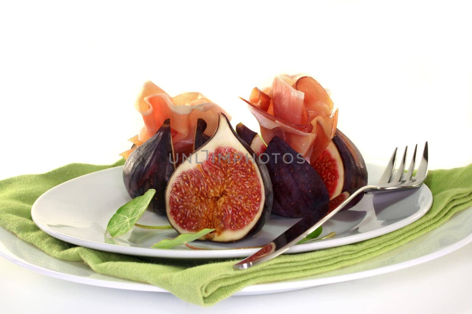 fresh figs with Italian ham and nasturtium cress