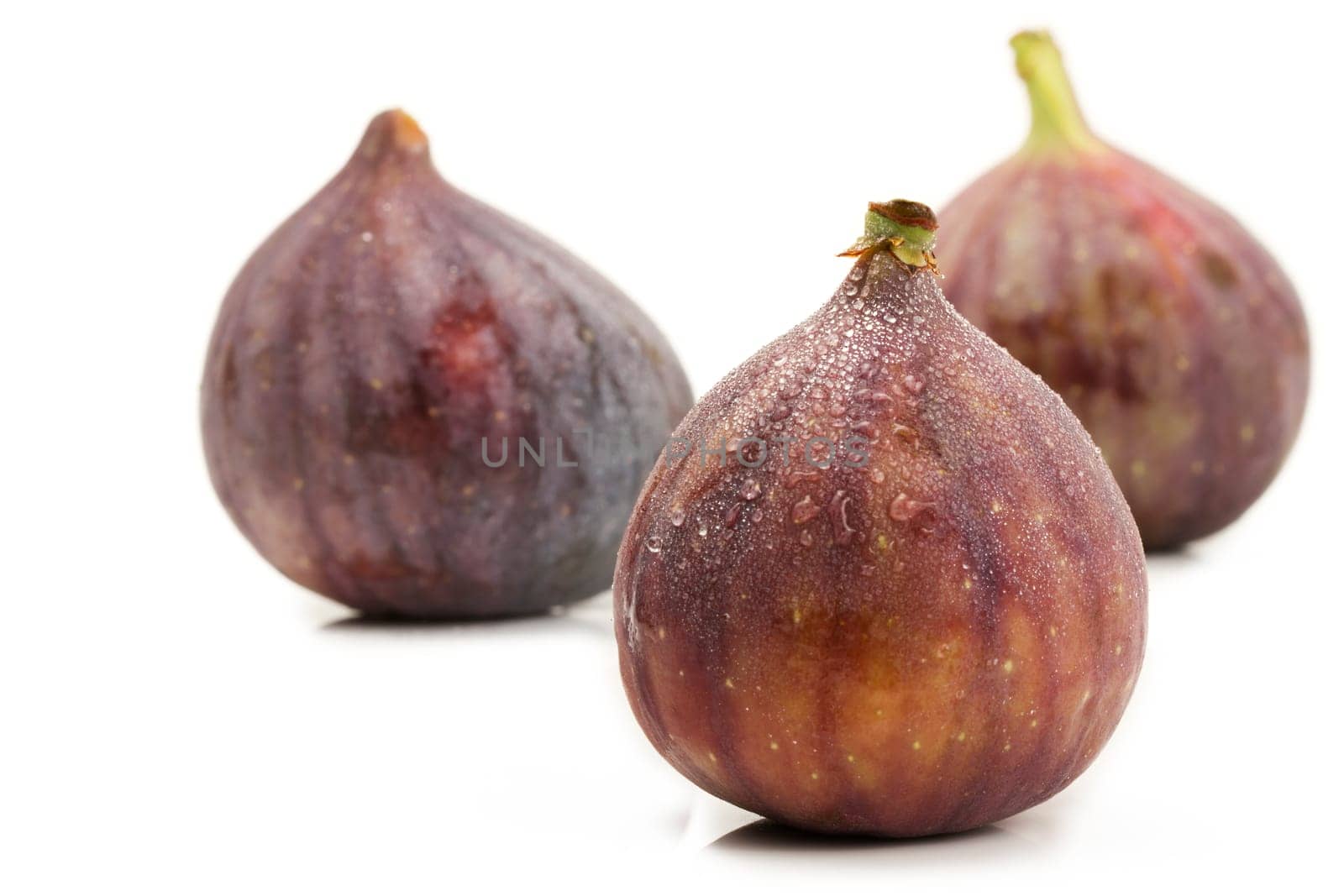 Wet fig in front of others