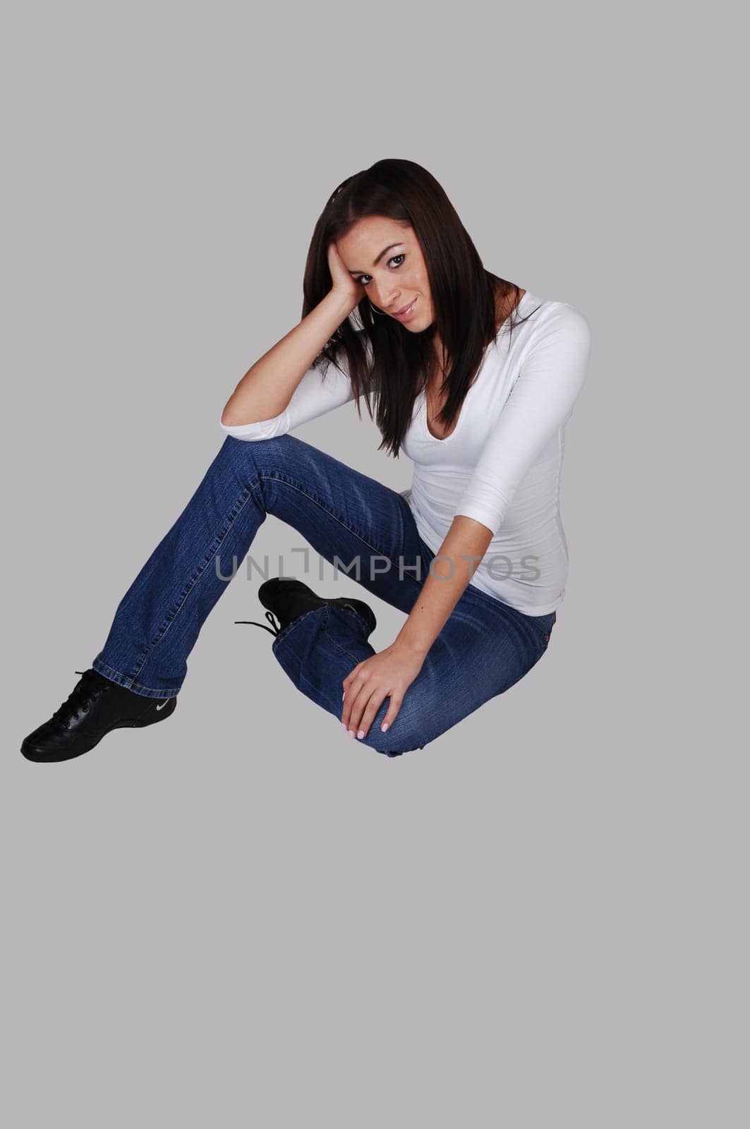 Smiling girl on the floor.