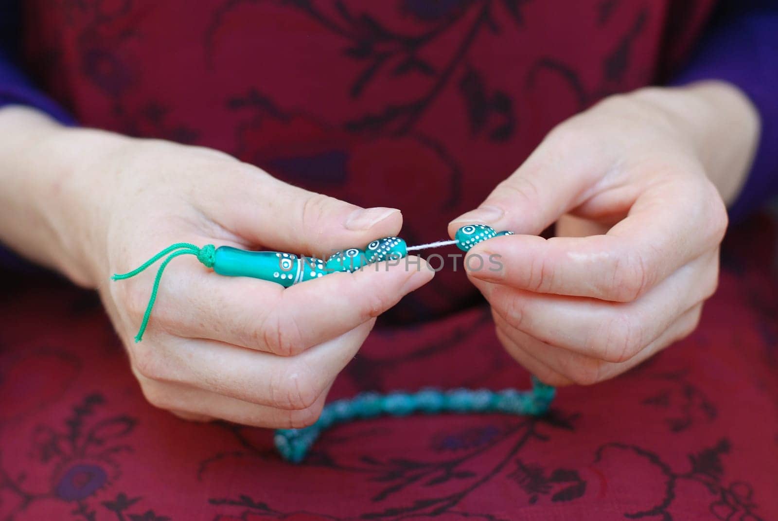 Woman with prayer beads