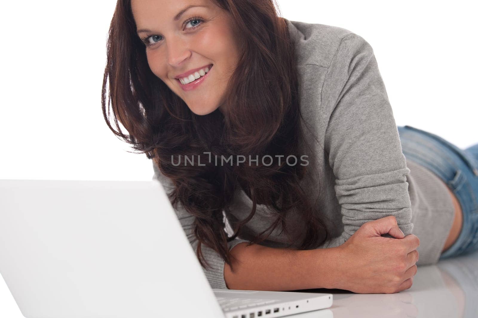Happy smiling young woman with laptop