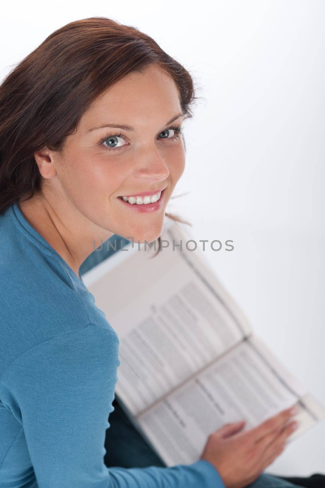 Smiling happy woman with book
