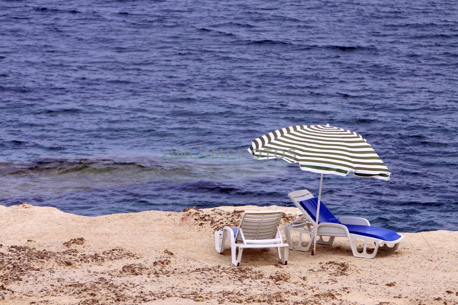 two lonely sun loungers