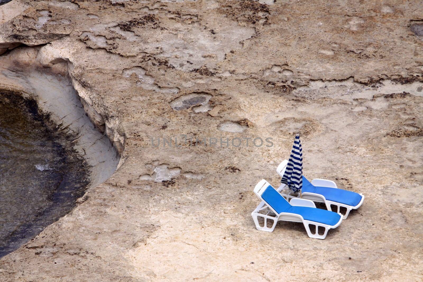 two lonely sun loungers