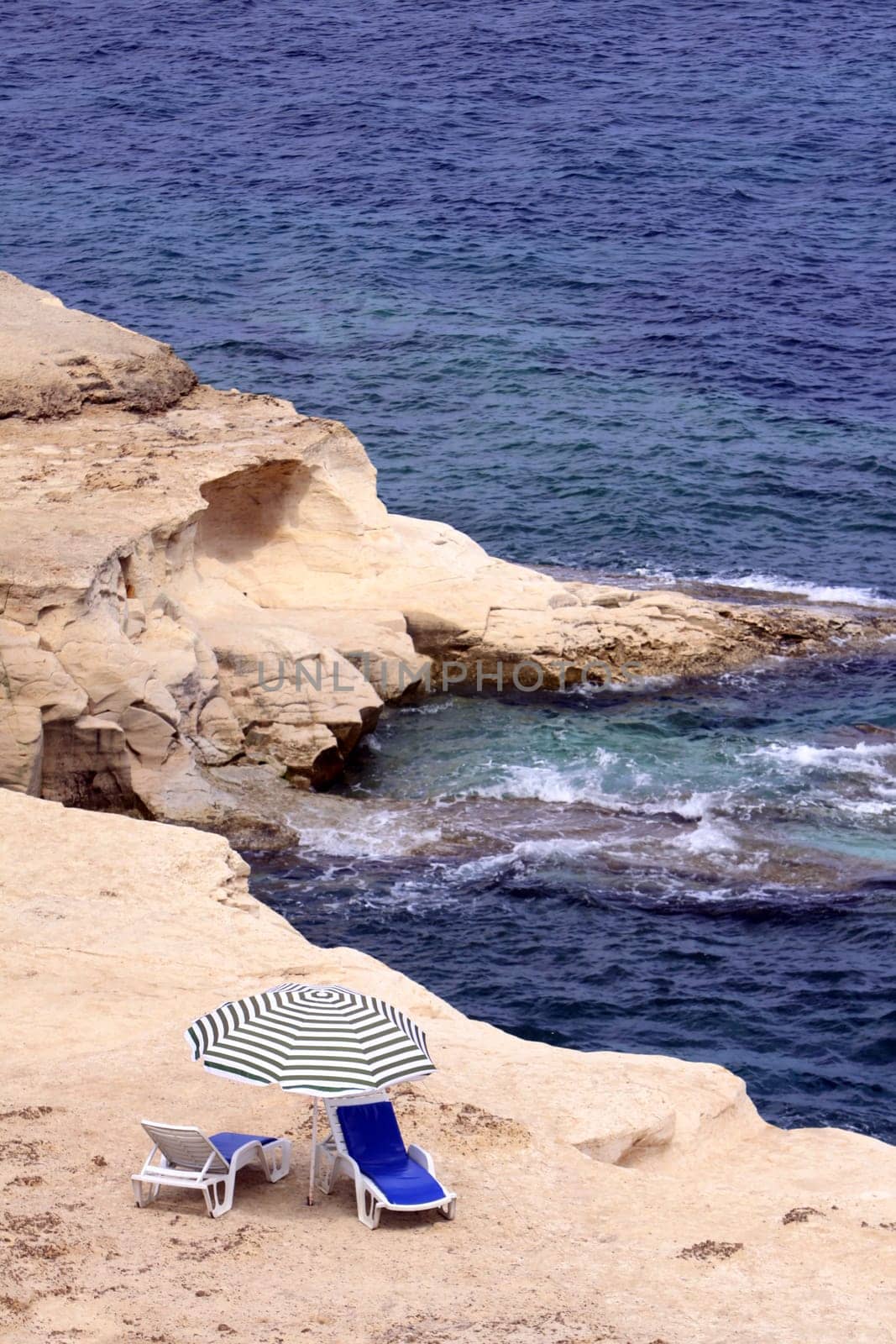 two lonely sun loungers