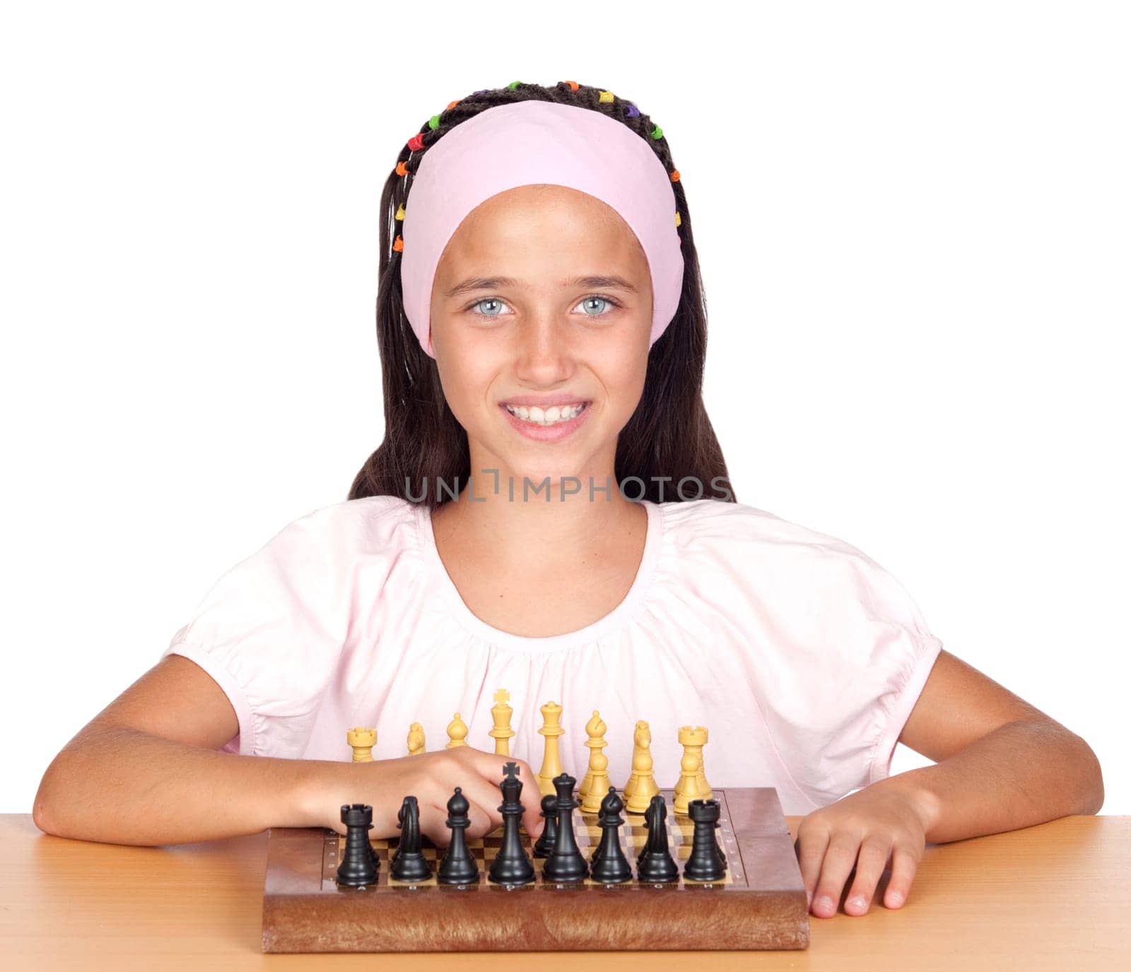 Little girl playing chess