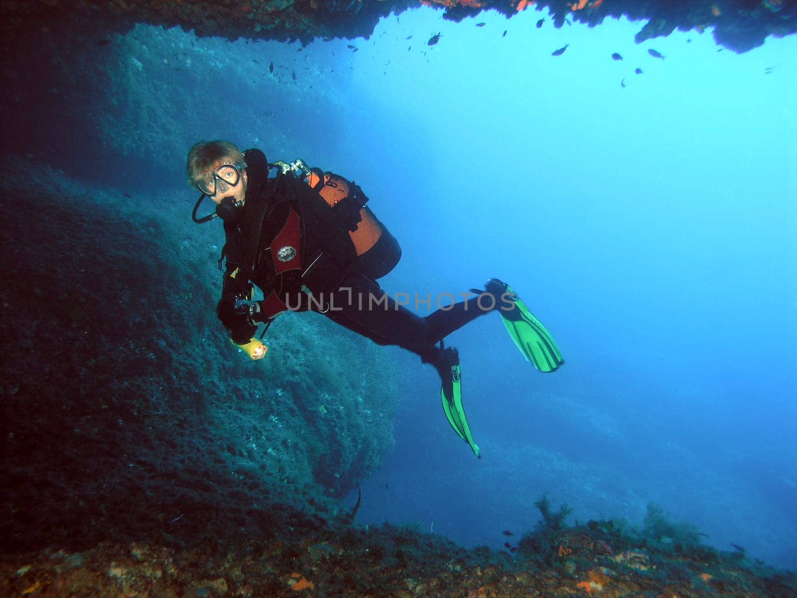 Diver at the cave entrance