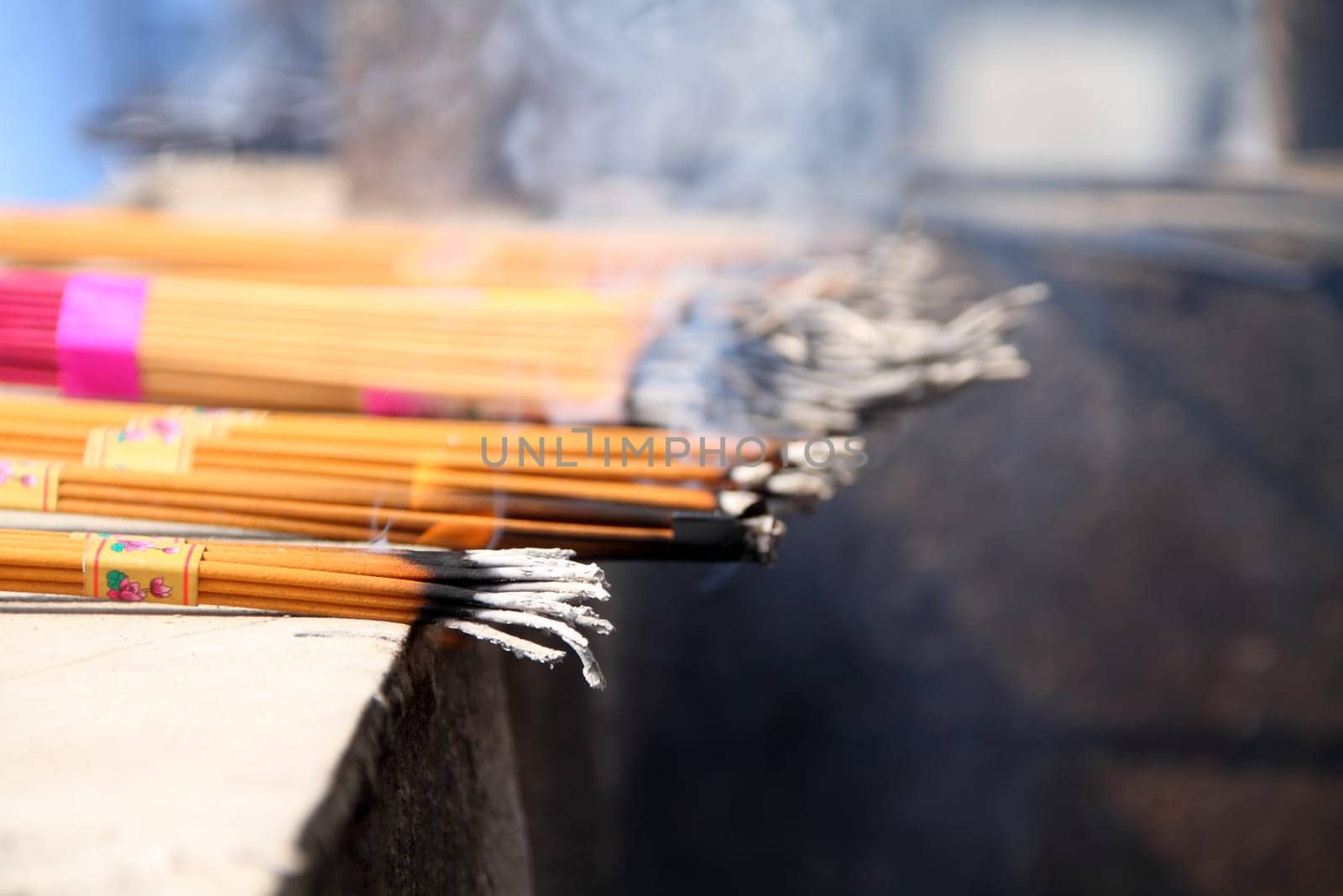 Burning incenses at a Buddhist temple