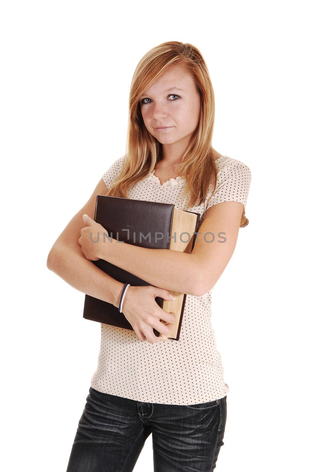 Girl holding big book.