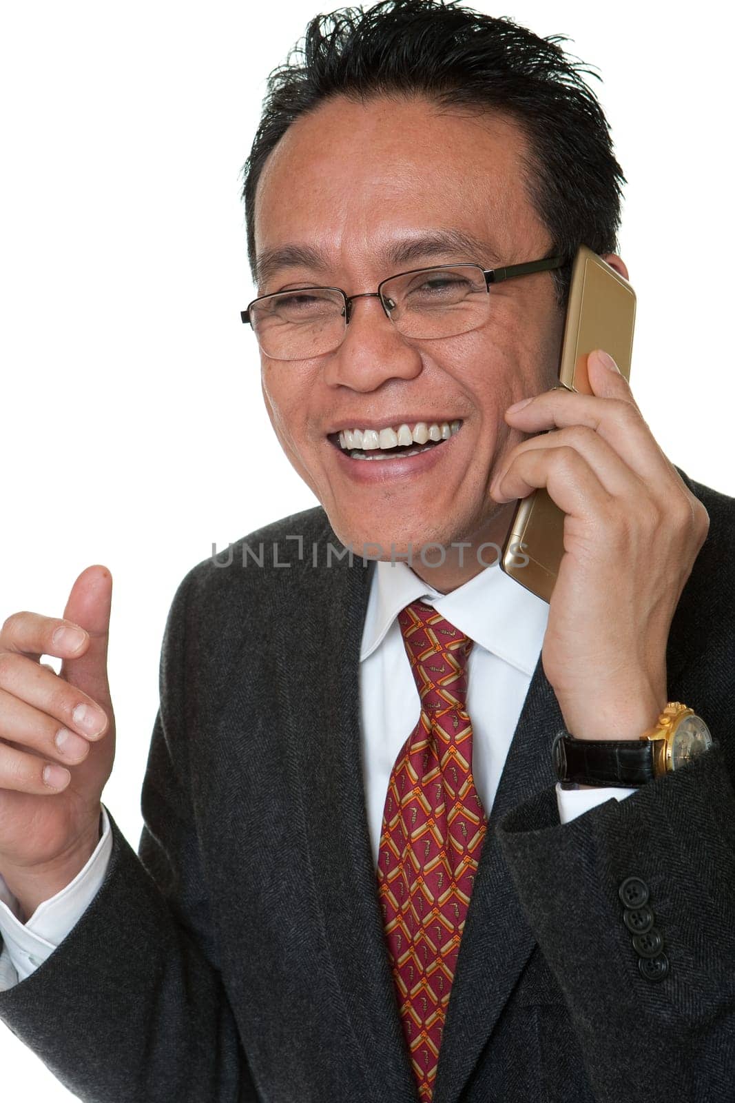Manager laughing while talking on the phone