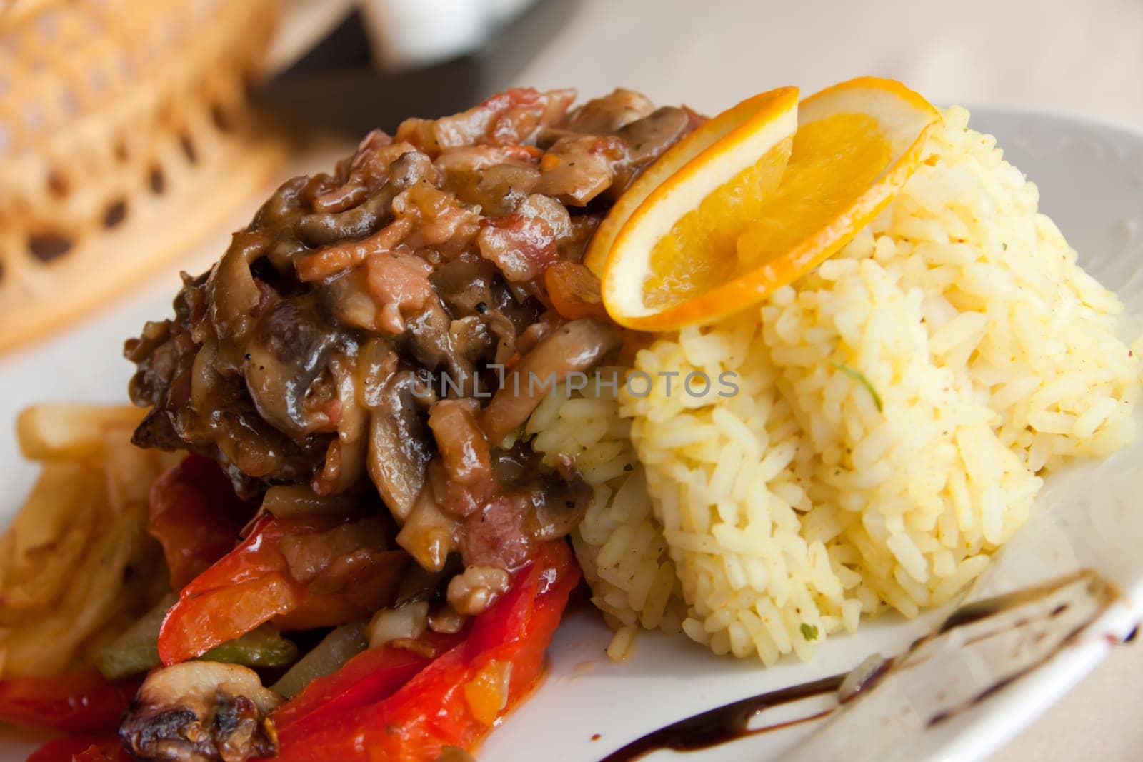 Veal schnitzel with rice and french fries