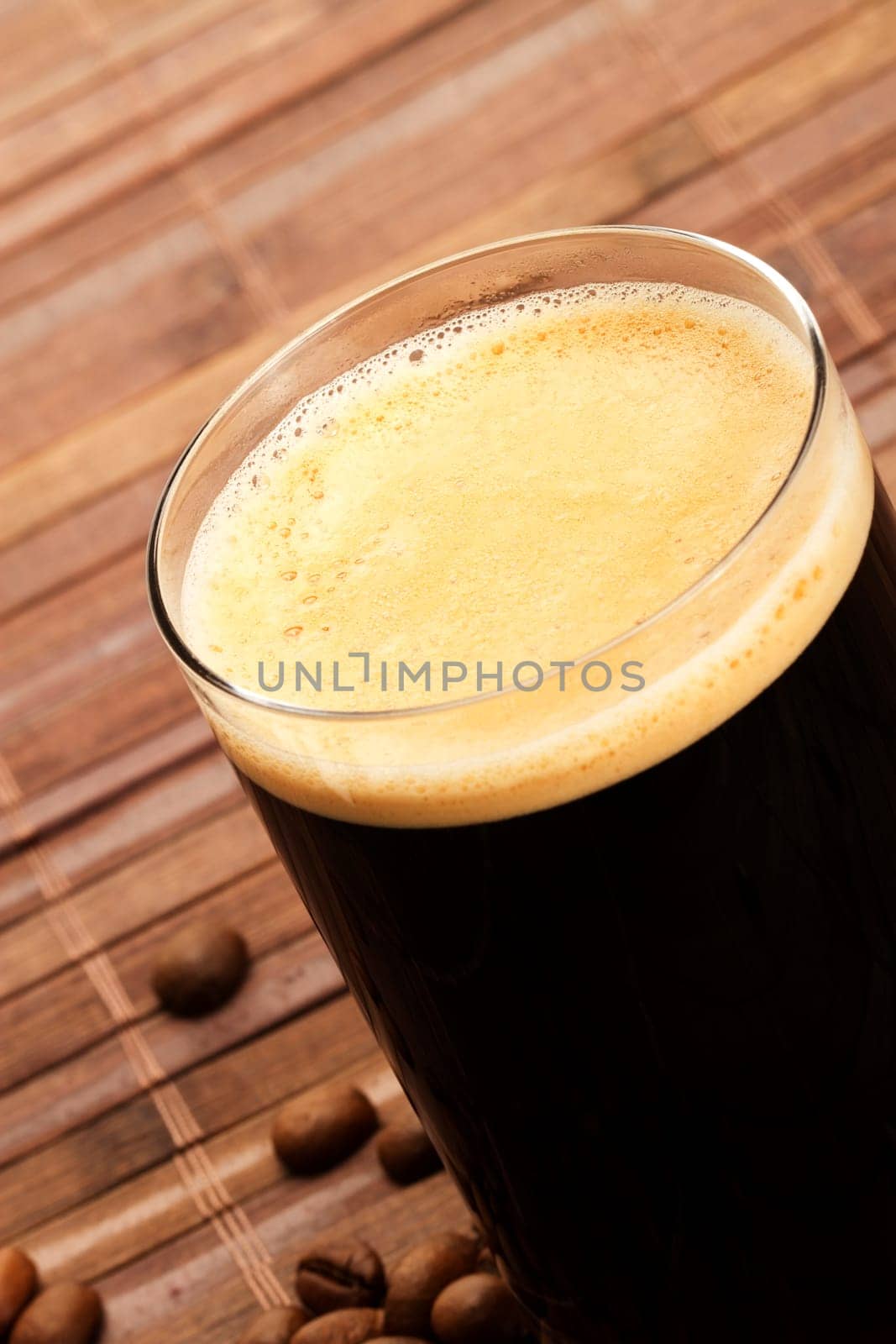 Espresso diagonal with coffee beans