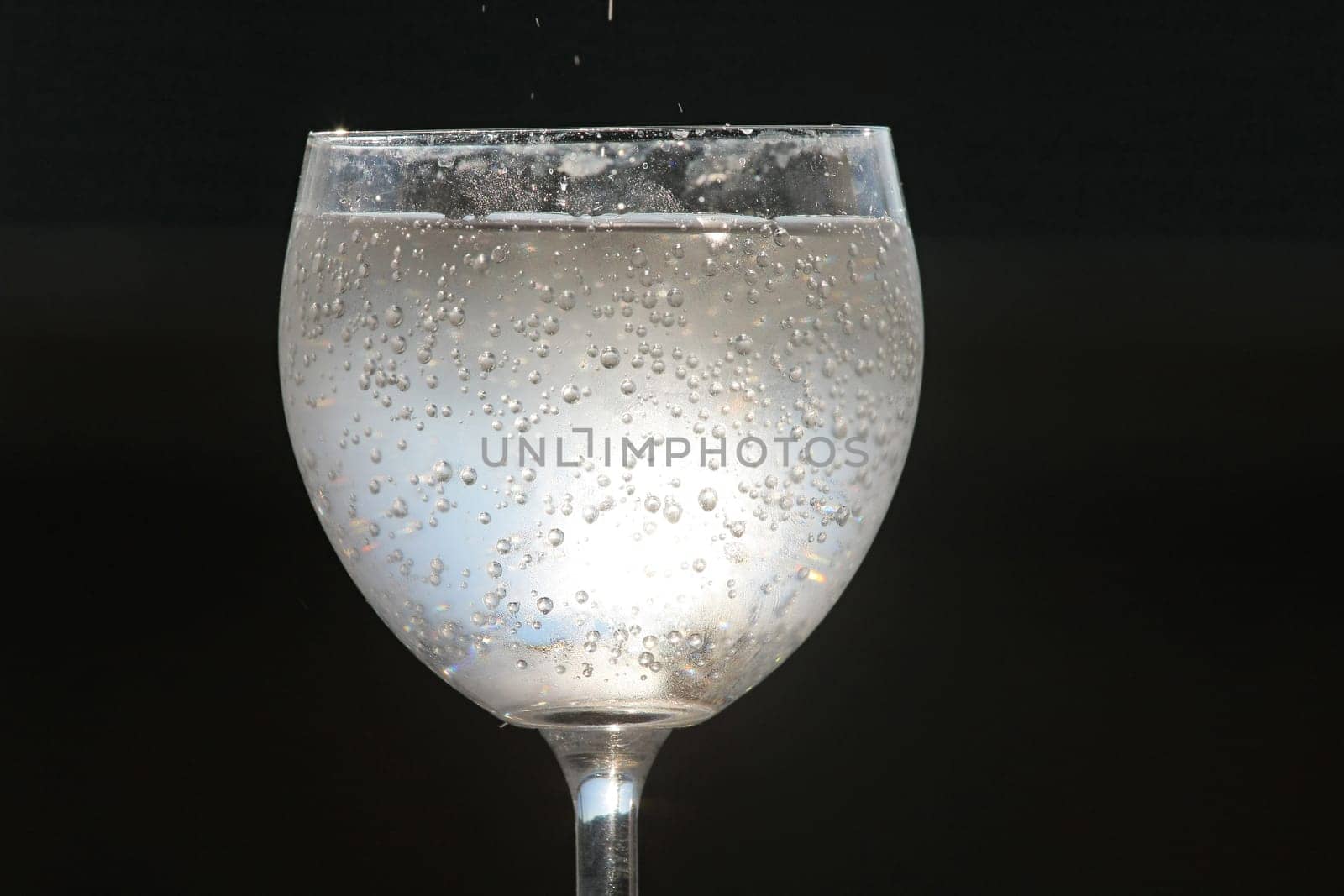Glass with drink.