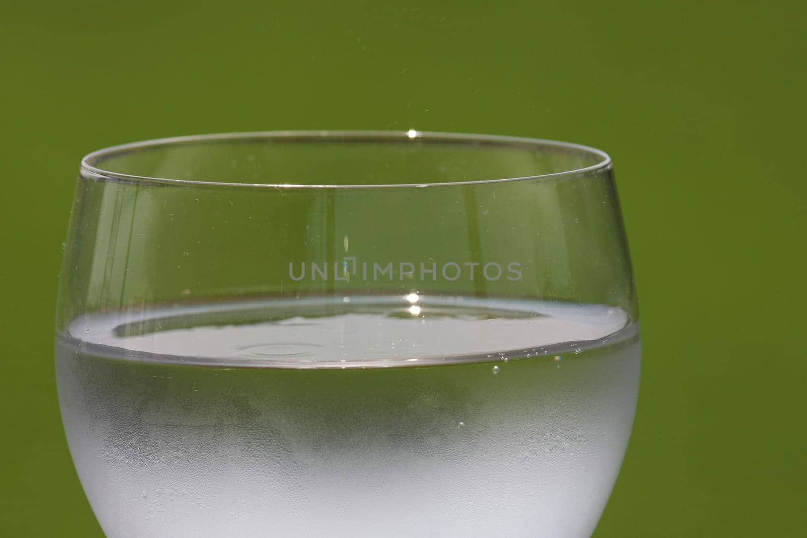 Fragment of glass filled with sparkling