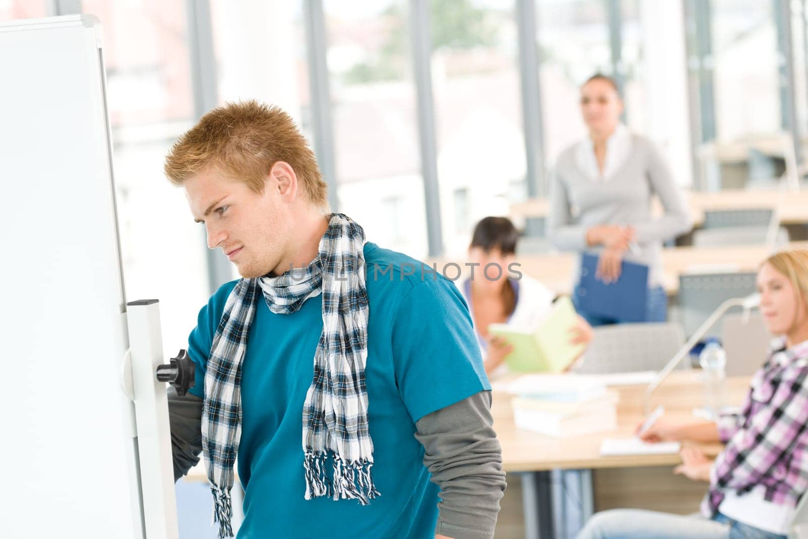 Three high school students in classroom