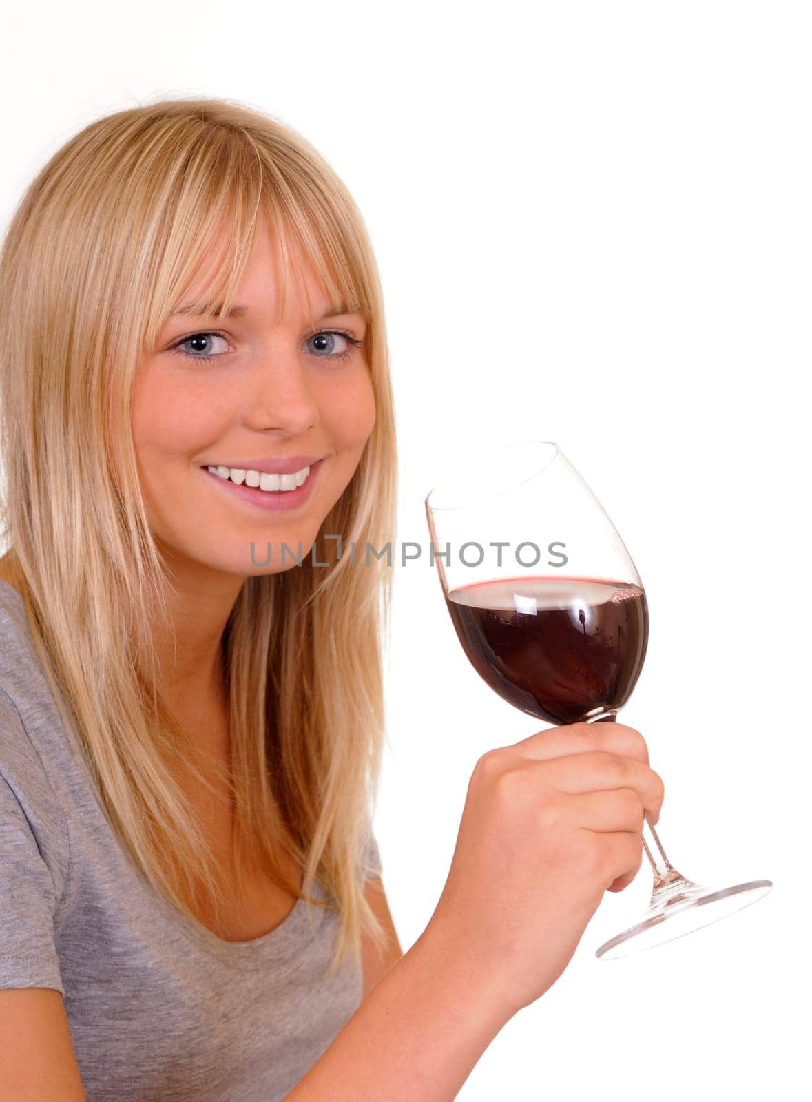 Young woman drinking red wine