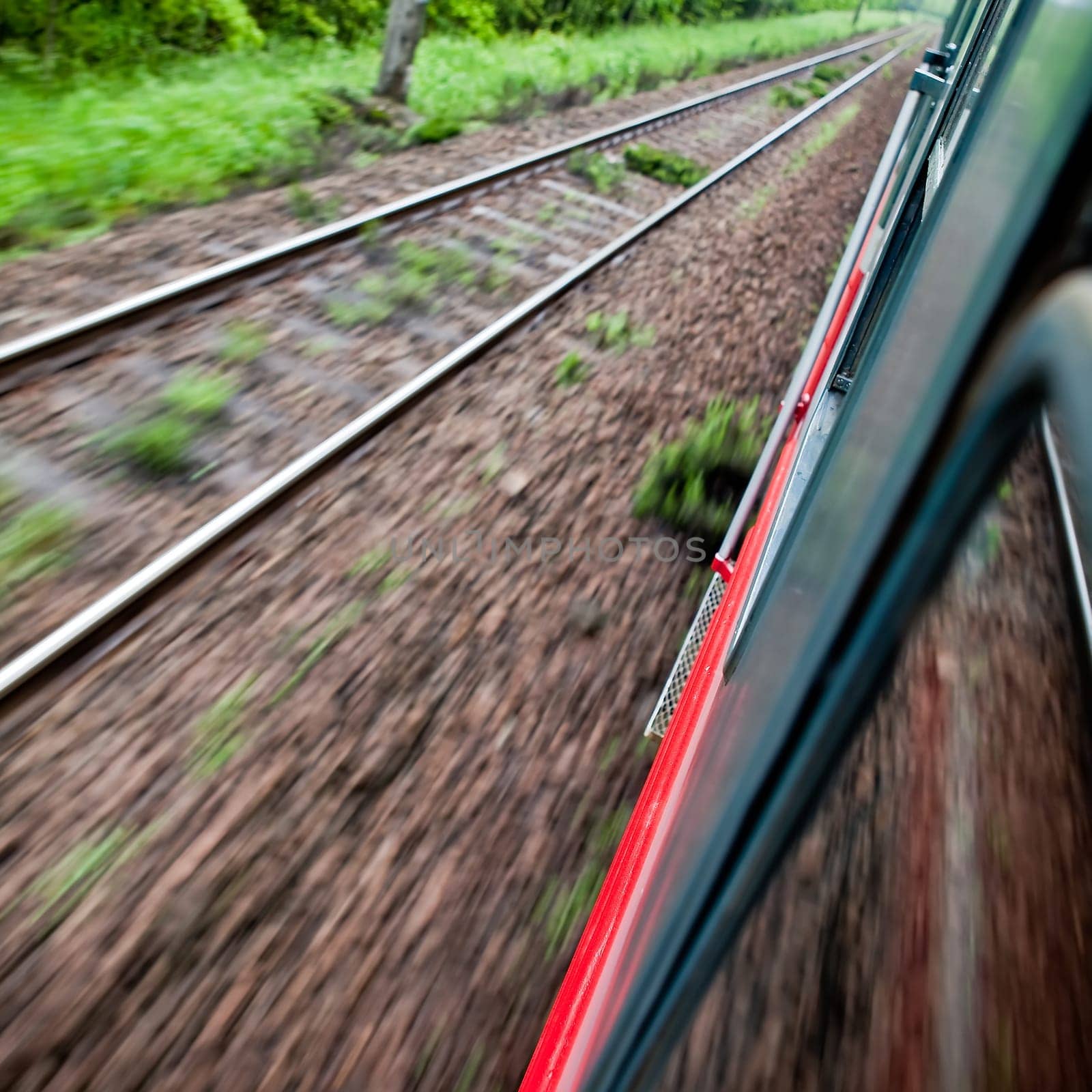 Fast riding a train with motion blur