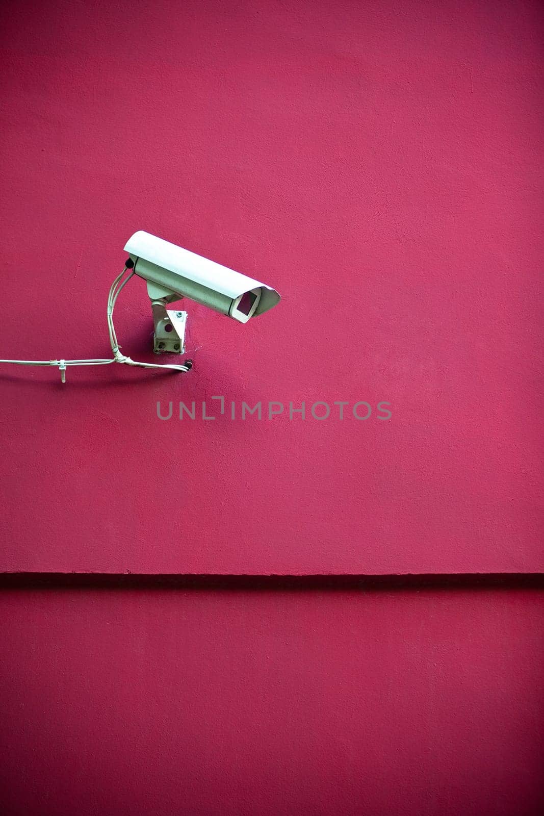 Security camera attached on building