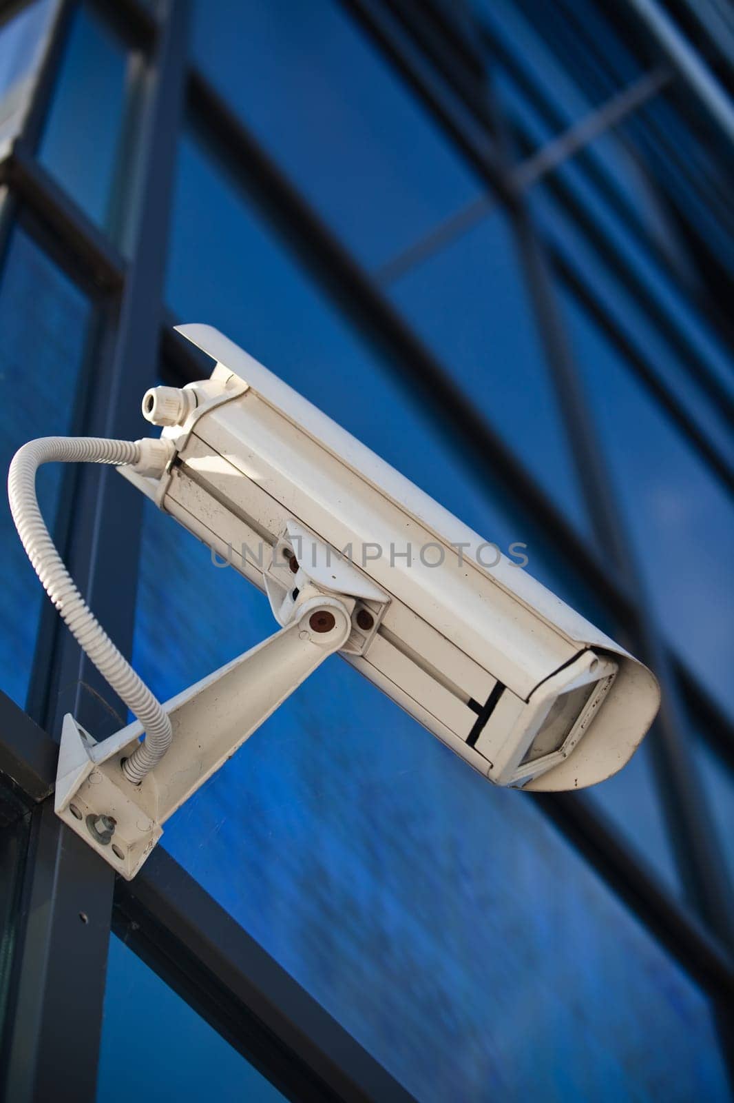 Security camera attached on building