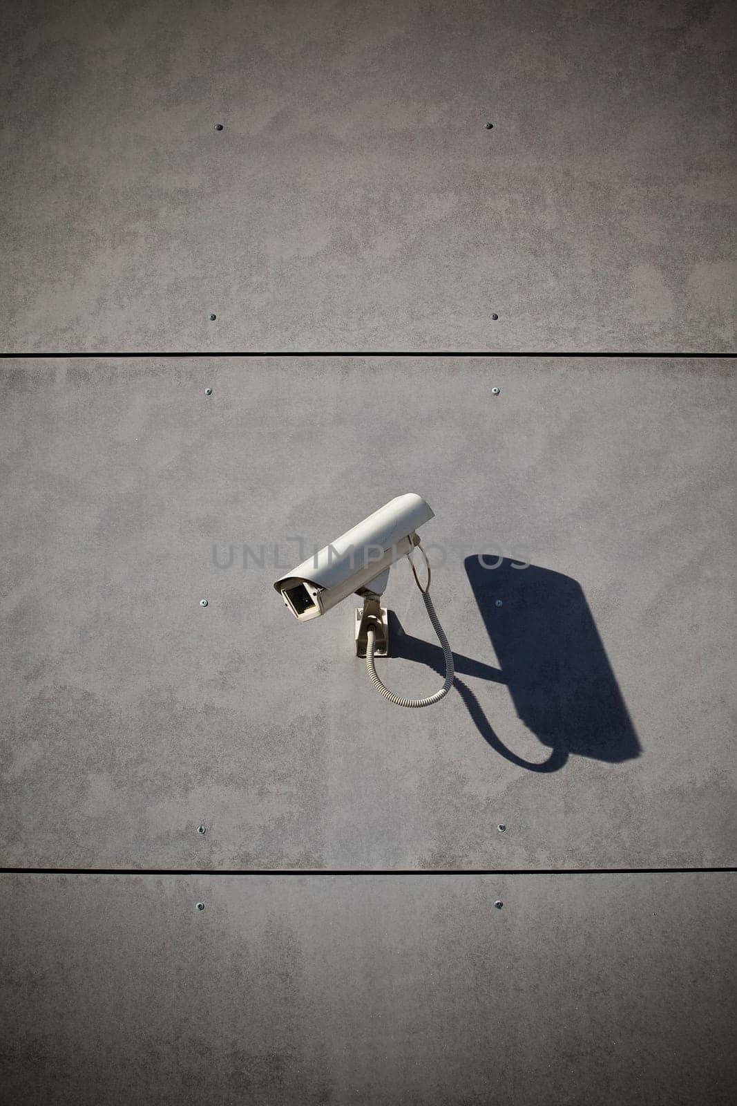 Security camera attached on building