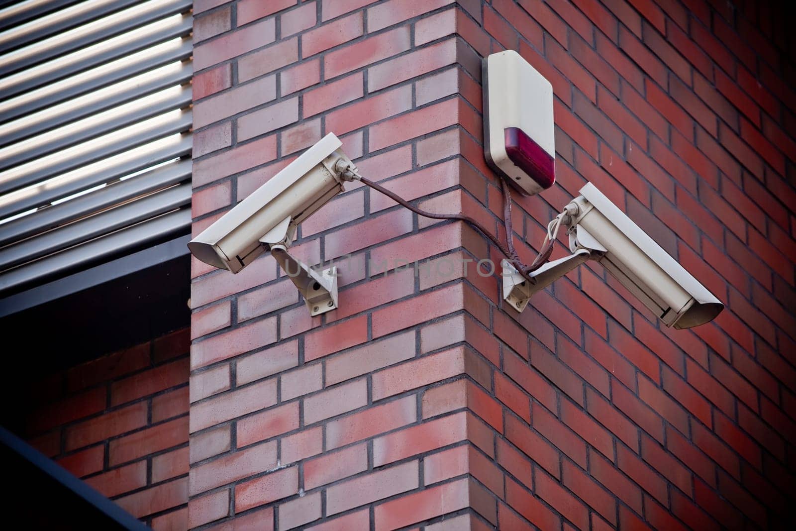 Security camera attached on building