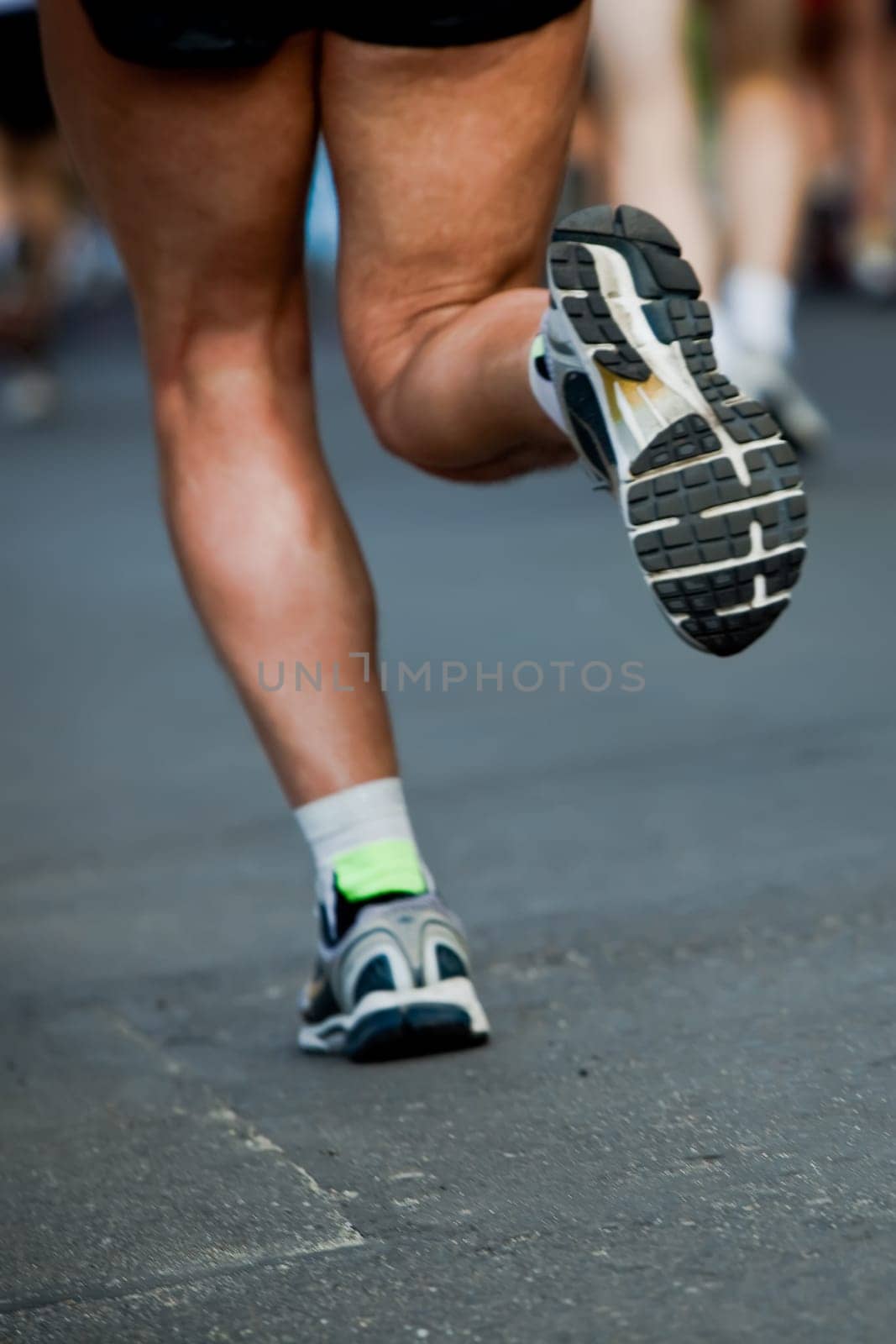 People running in city marathon