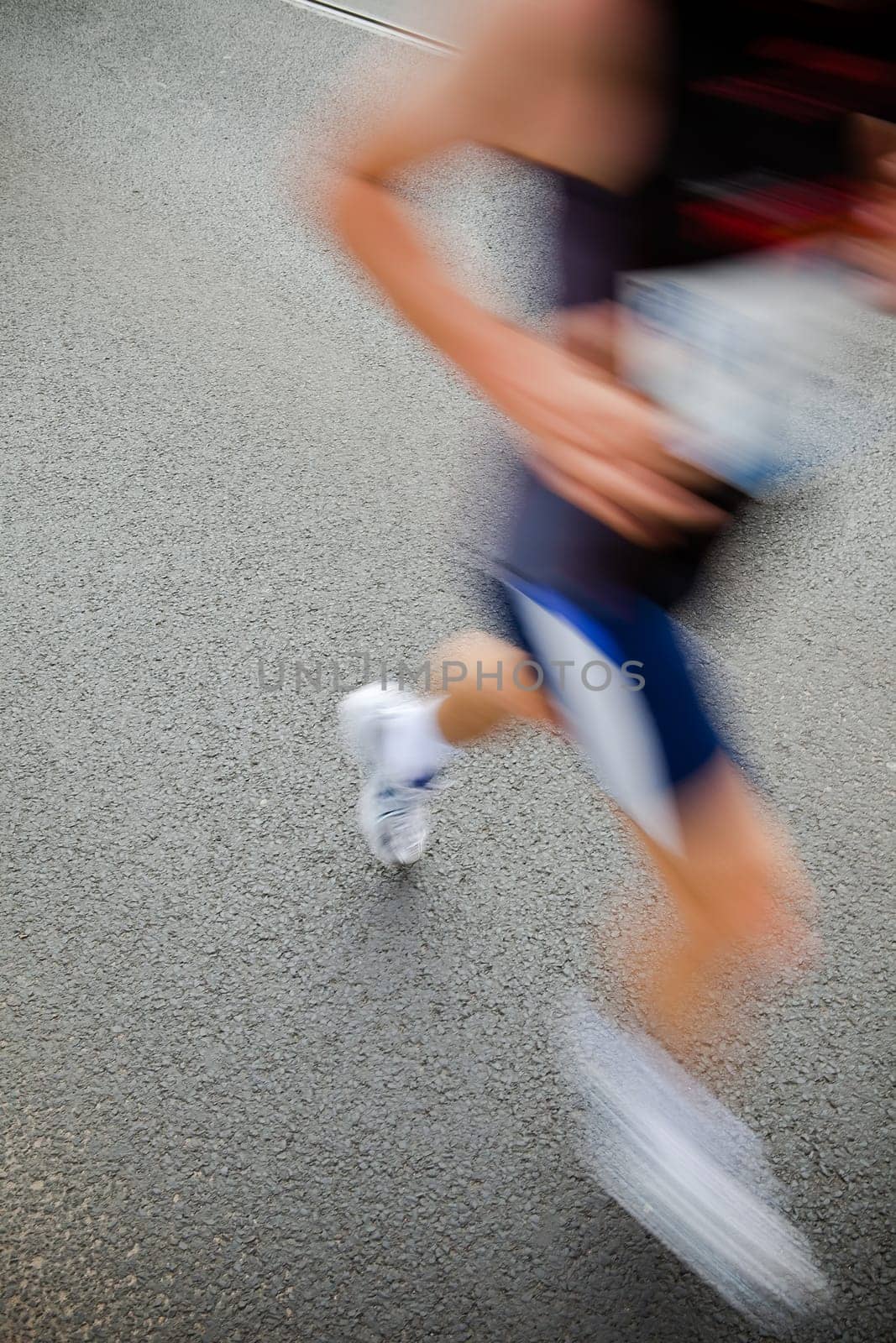 People running in city marathon