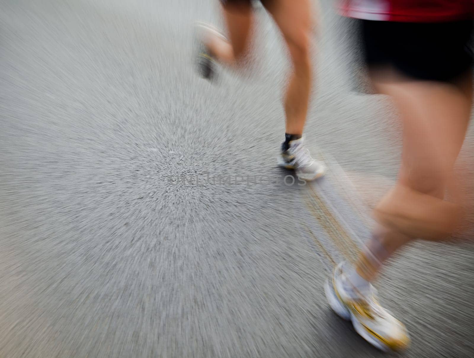 People running in city marathon