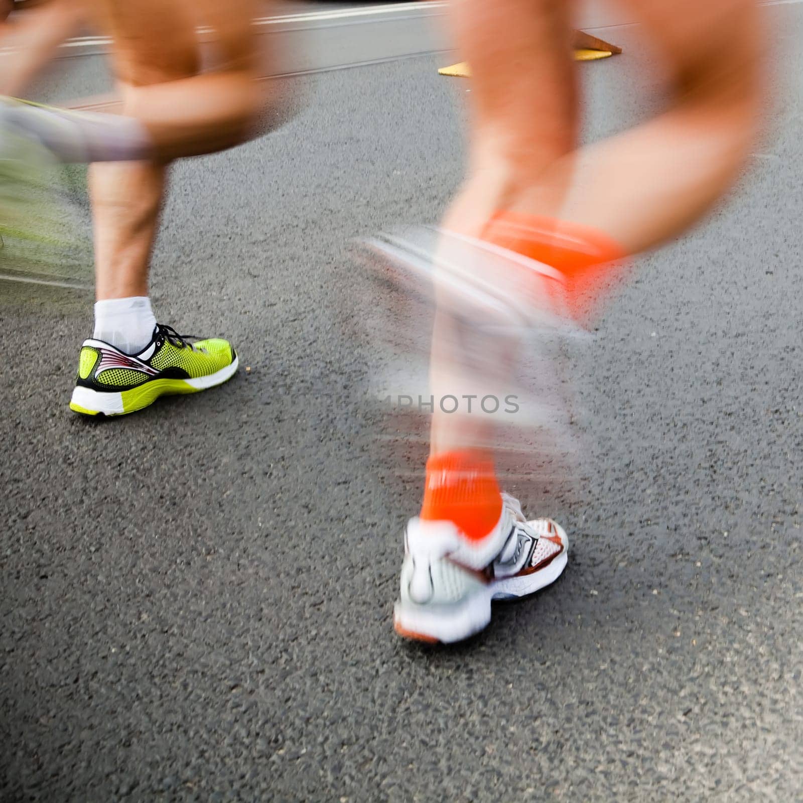 People running in city marathon