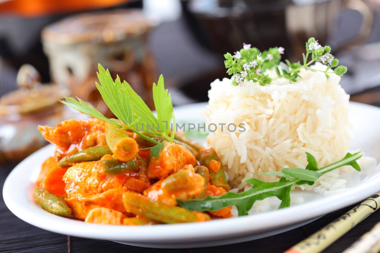Red chicken curry stripes with rice