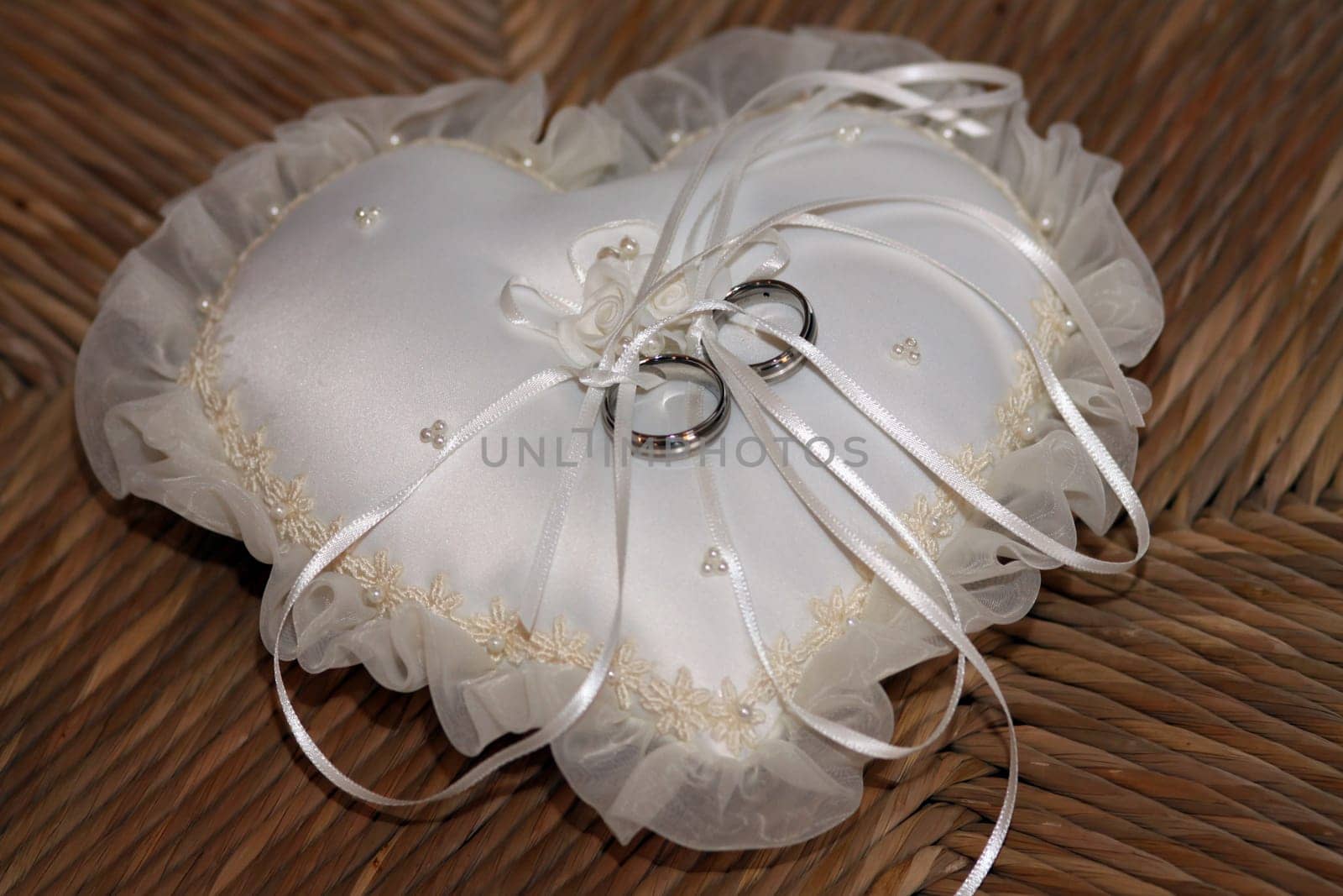 Wedding rings on velvet cushions