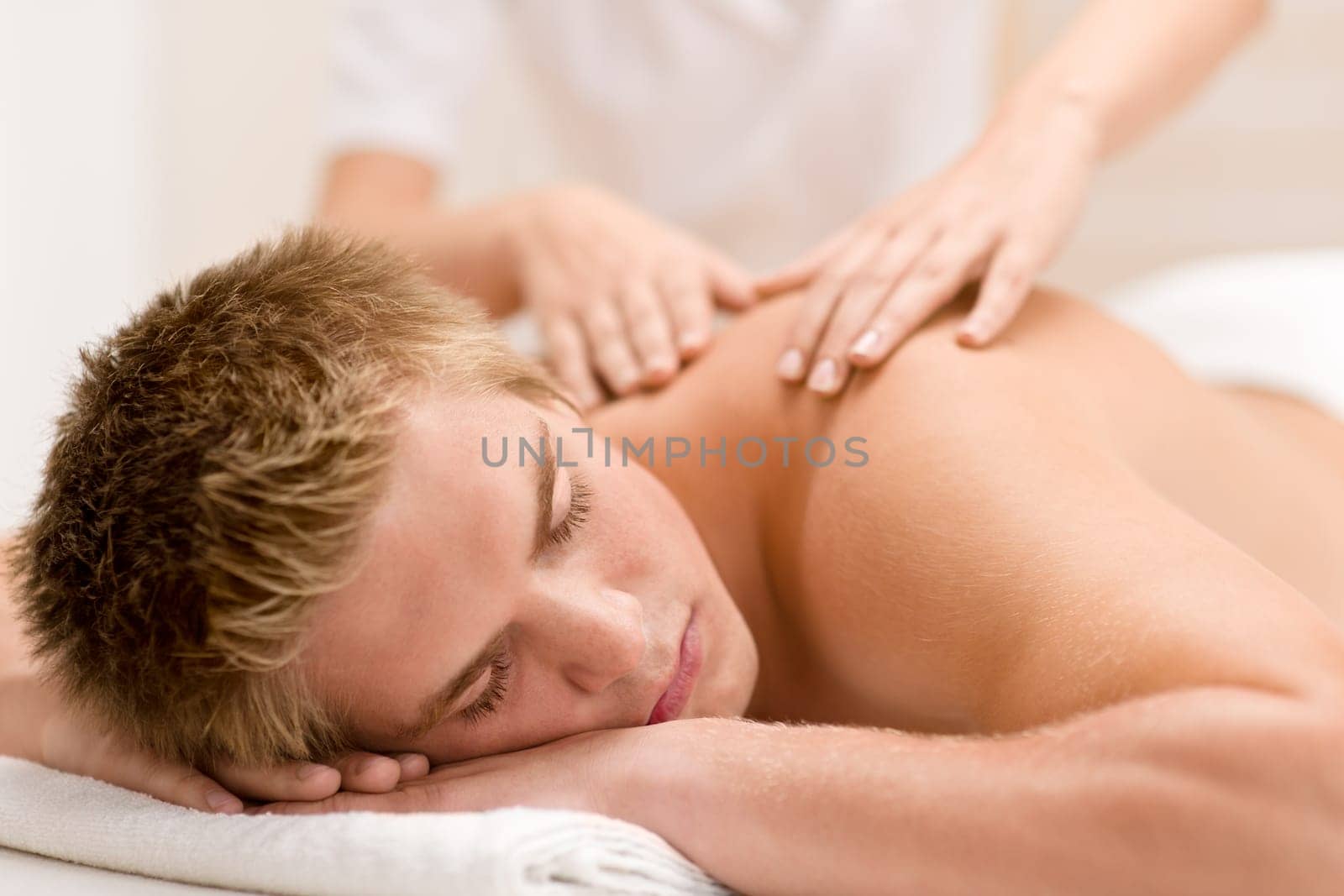 Day spa - man receiving massage