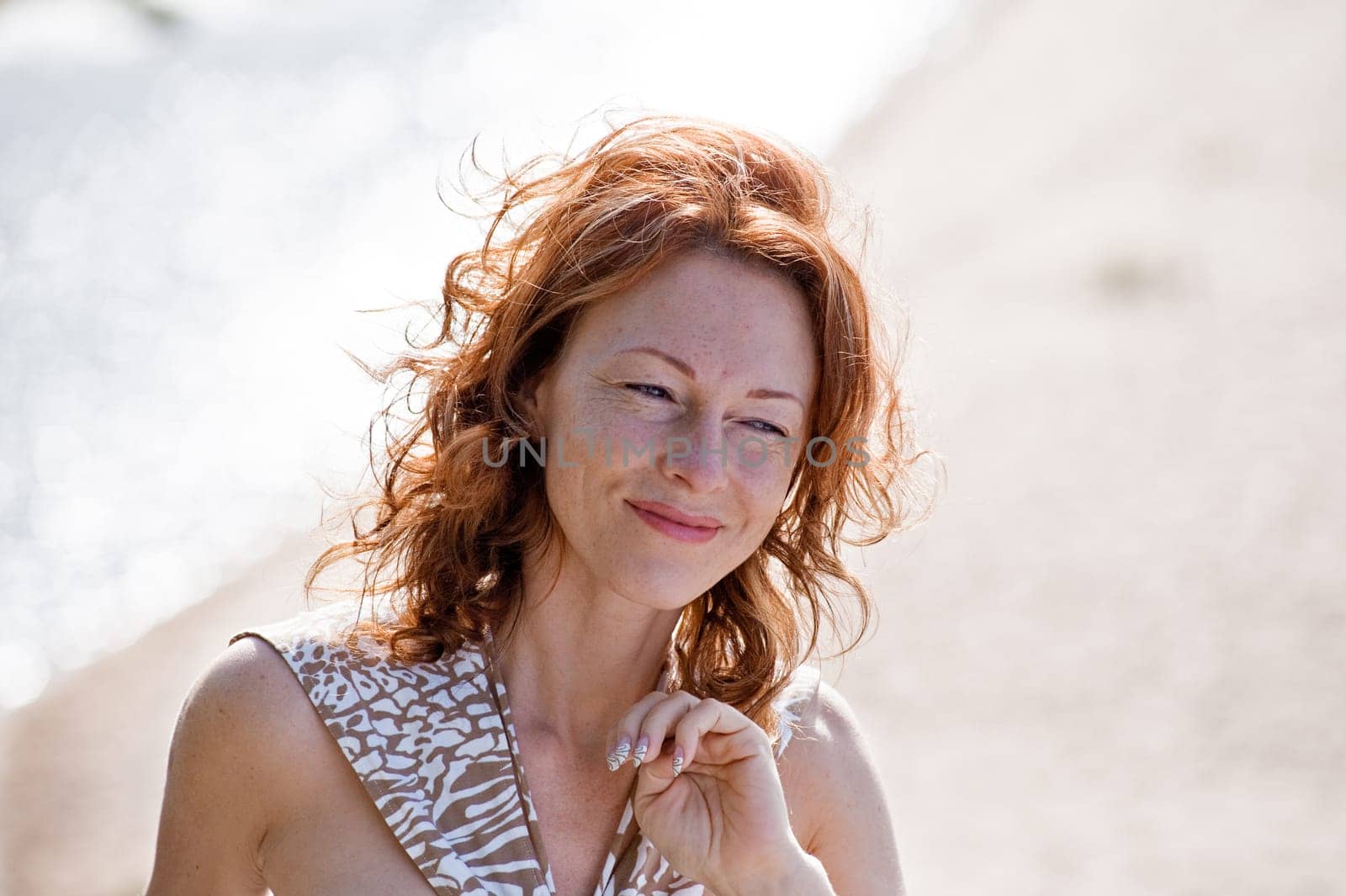 Portrait of red-haired adult women in du