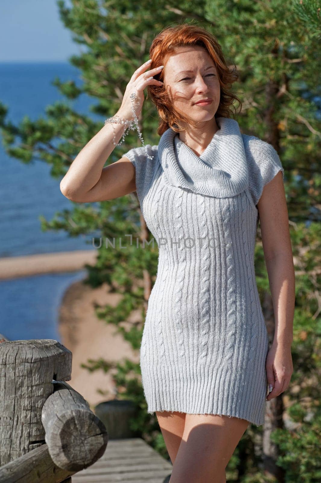Sexy adult women in dune at the sea